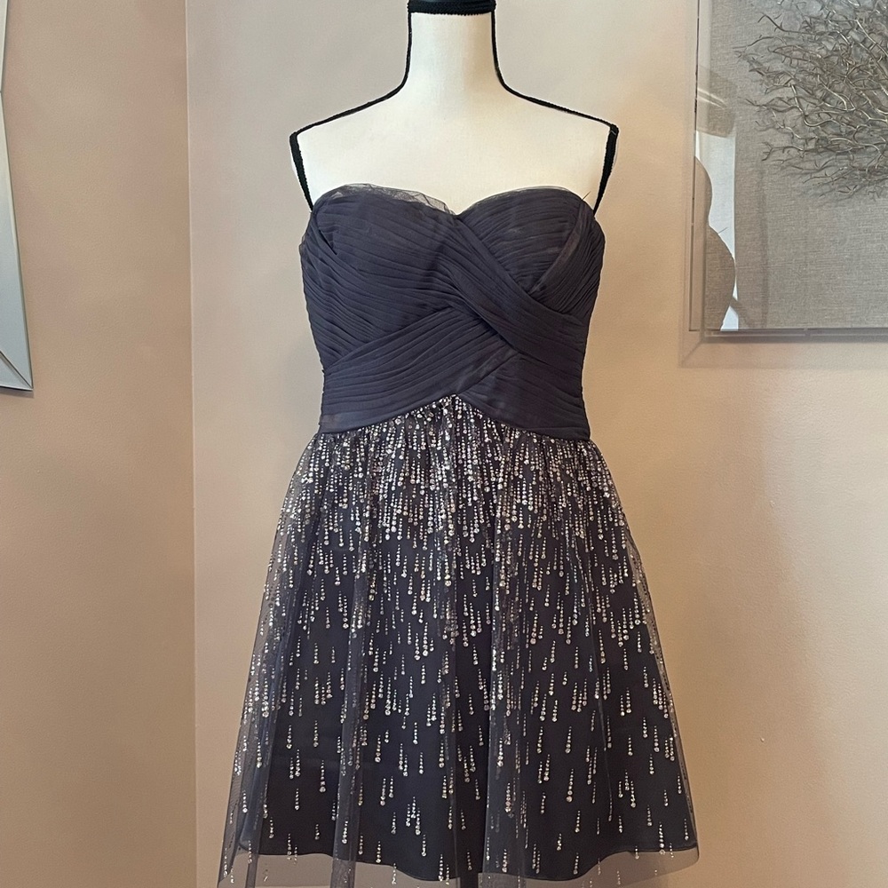 Brand New dress. Concealed back zip closure, lined, polyester